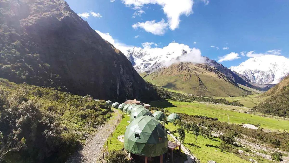 Glamping domes below the glacier on a Salkantay trek tour, the 4-day Sky Lodge domes Salkantay trek from Cusco, Peru