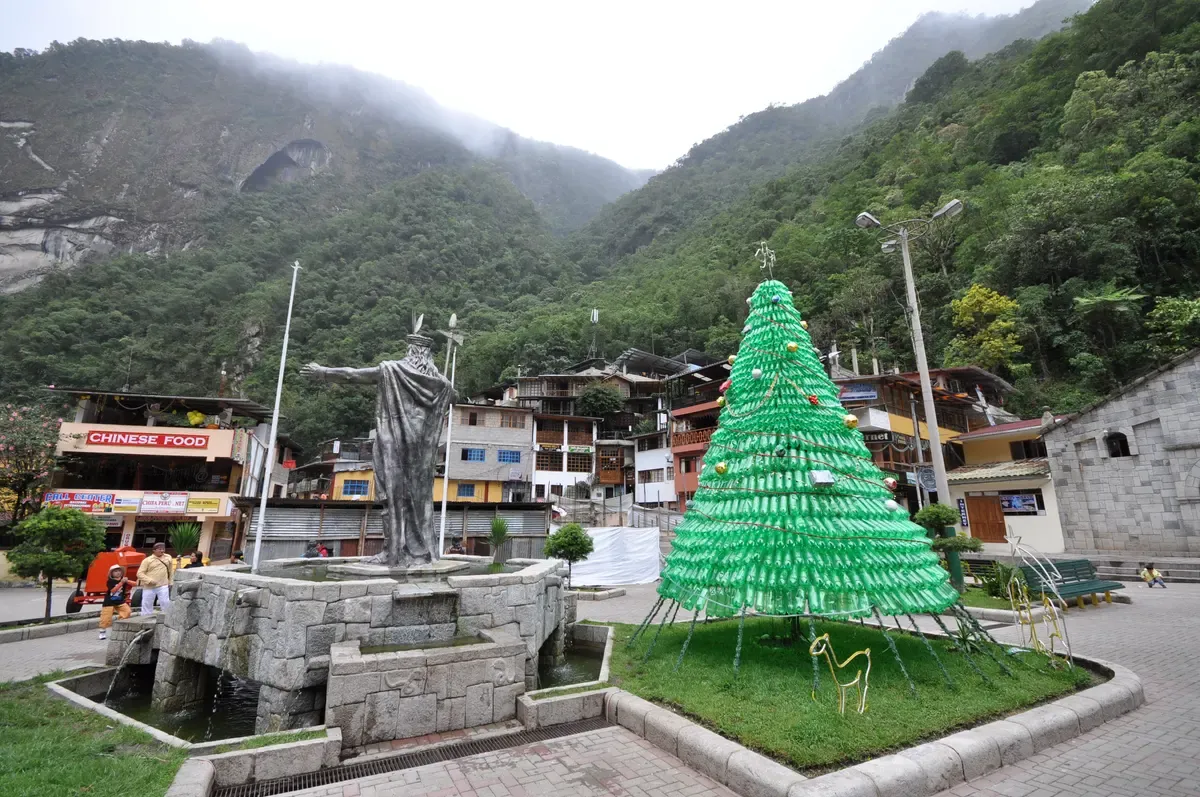 The main square of Aguas Calientes with the statue of Pachacutec, on the Salkantay trek route