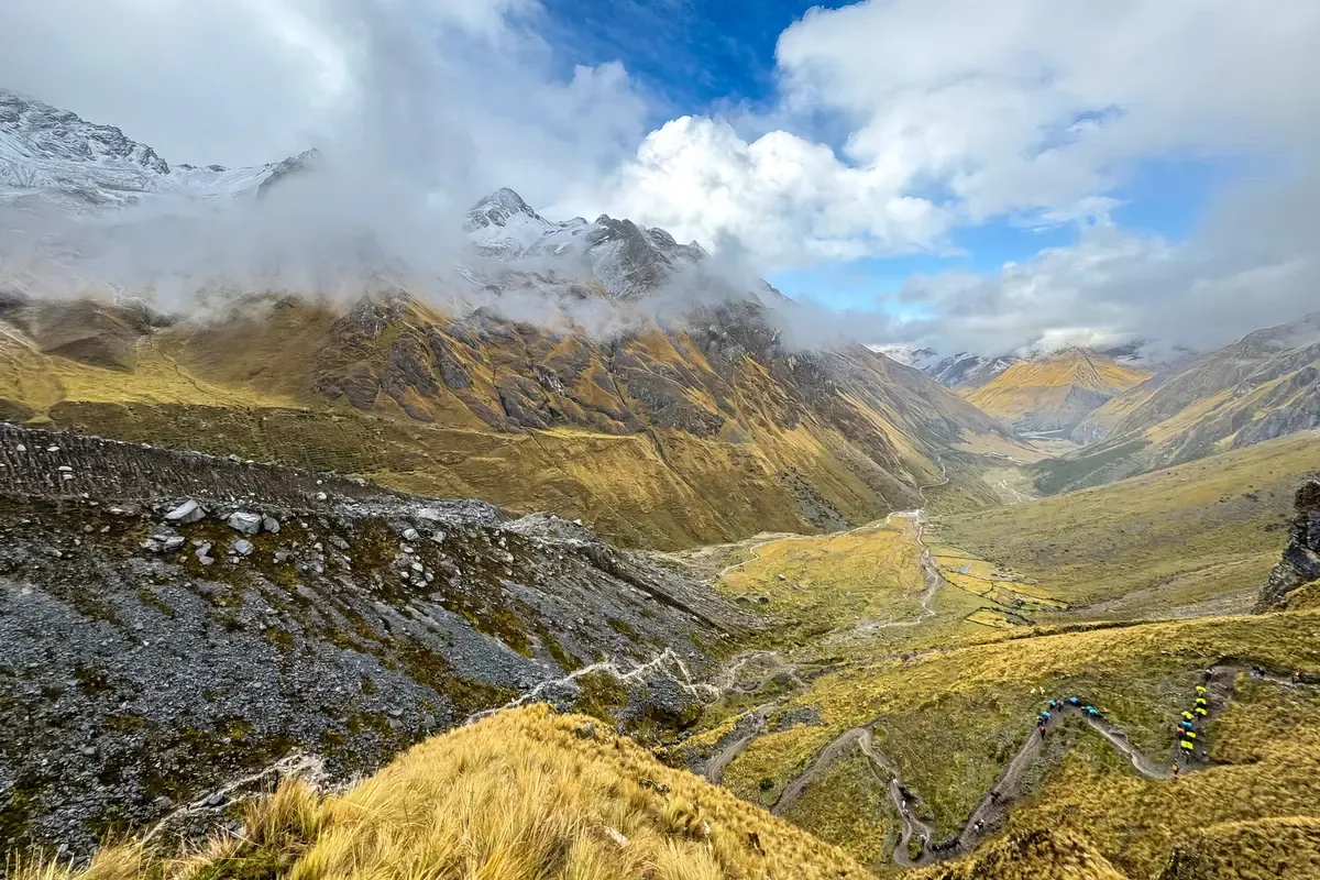 Trekkers on the switchbacks below the Salkantay Pass, on the Salkantay trek route